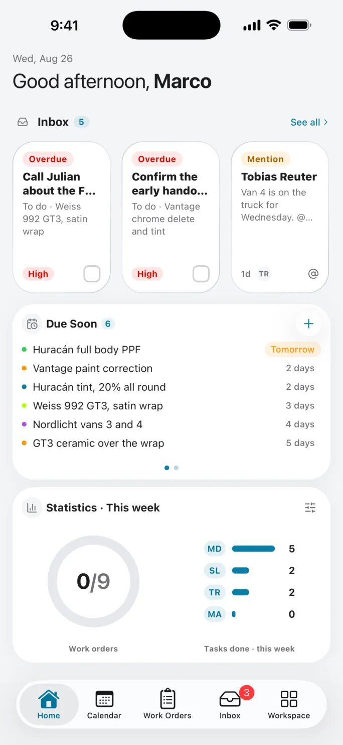 Slate home on iPhone, with inbox cards, upcoming work orders, weekly completion and teammate task activity.